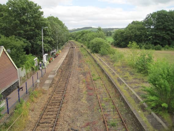 Yeoford station's active platform (left) contrasts with the abandoned and overgrown second platform (right), a visible sign of the Tarka Line's decades of underinvestment. © Copyright Nigel Thompson