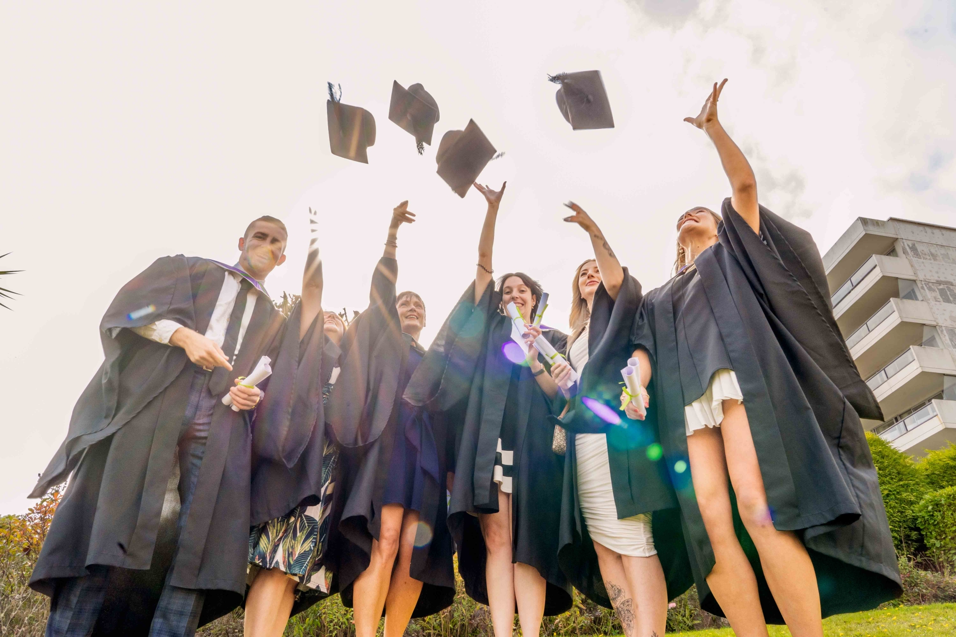 2024 University Centre South Devon graduates celebrate collecting their degrees.