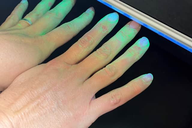 Julia Chisnell, Public Health Consultant at Torbay Council, explained how the handwashing kit works: "The children put some gel on and then put their hands under the light box, which shows the germs under the UV light. They go away and wash their hands and then come back to see how much they’ve missed. That shows how well they’ve washed their hands and how they can improve next time. The children have been loving it and are great ambassadors for handwashing.”