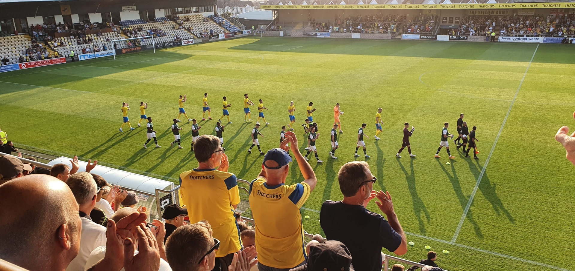 Torquay United take to the field at Plainmoor