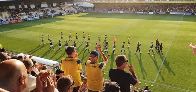 Torquay United take to the field at Plainmoor
