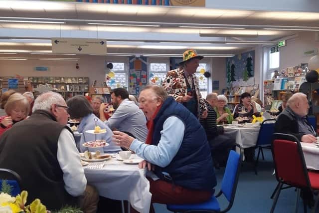 Churston Library celebrates golden year with 1970s party
