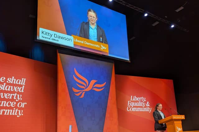 Kitty Dawson on the stage and big screen at the national Liberal Democrat party conference