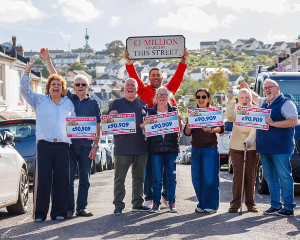 A few of the Postcode Lottery's Millionaire Street prize winners 
