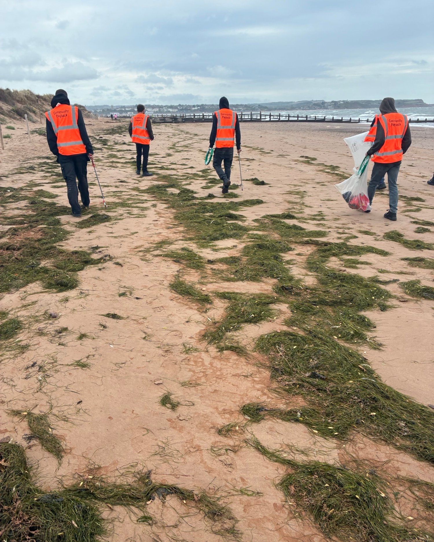 Offenders on community payback clean up Goodrington Sands