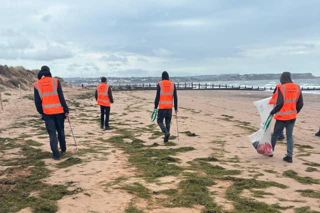 Community payback teams during the Great British Beach Clean at Dawlish Warren