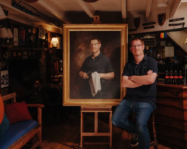 Simon Dafforn-Jones, landlord of the Ferry Boat Inn at Dittisham, with his portrait painted by by Jamie Coreth
