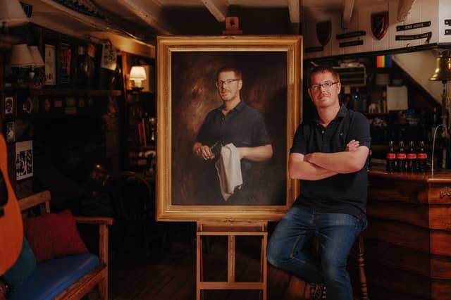 Simon Dafforn-Jones, landlord of the Ferry Boat Inn at Dittisham, with his portrait painted by by Jamie Coreth