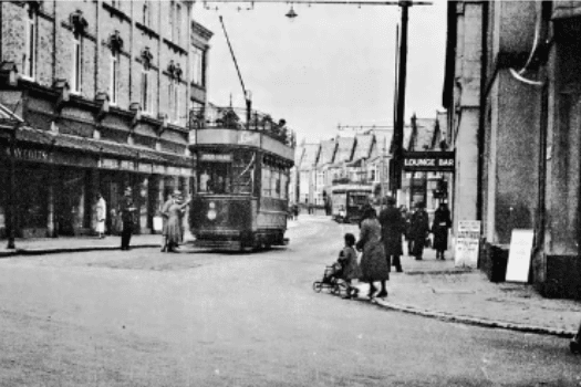 Tram on the junction of Hyde Road and Station Square