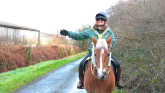 Pictured: Rider from Mare and Foal Sanctuary demonstrating hand signals