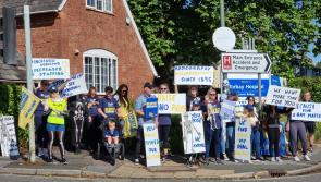 Striking radiographers dress as skeletons as they picket outside Torbay Hospital