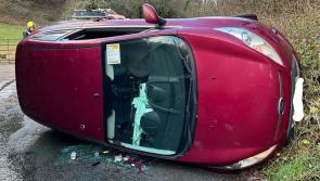 Car flips on icy road near Torquay