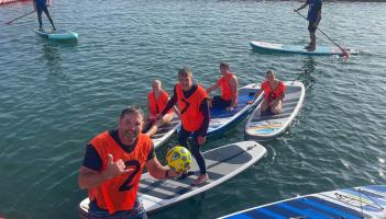 Organiser Brendon Prince and the SUP POLO  tournament winners at the SUPERFestival.