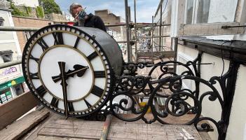 Telling time for the 150-year-old Conroy Couch clock
