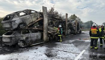 The fire-wrecked transporter and cars on the M5  Pic Devon and Cornwall Roads Policing Team