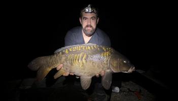 Tom Stebbens with a Mirror Carp