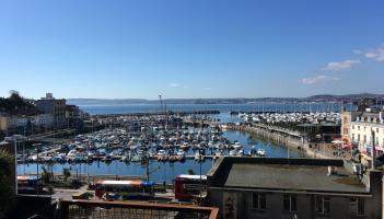Torquay Harbour, looking across Torbay towards Paignton and Brixham (Image: Ed Oldfield )