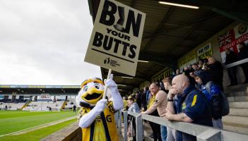 Torquay United and mascot Gilbert backing Bin Your Butts campaign