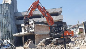 Diggers move in as full-scale demolition begins at Crossways Paignton