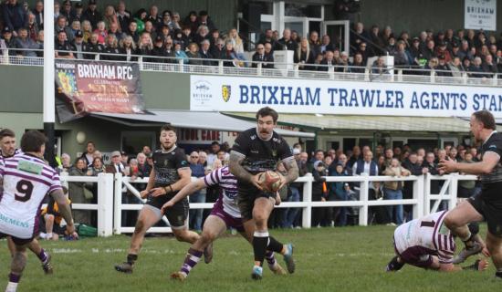 Packed stands at Astley Park for Devon Final