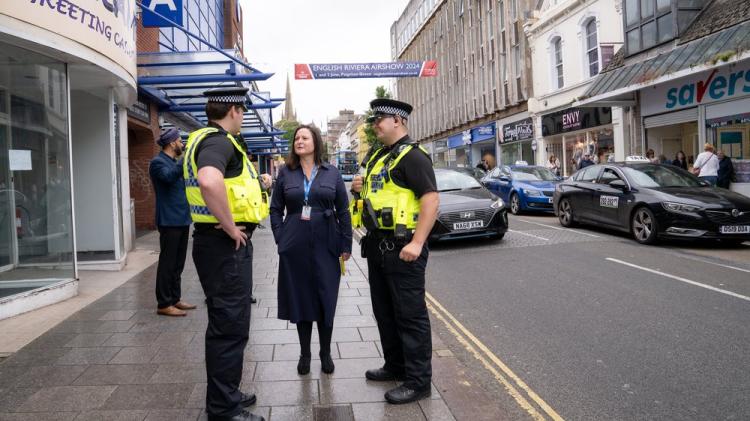 Alison Hernandez with police in Torquay