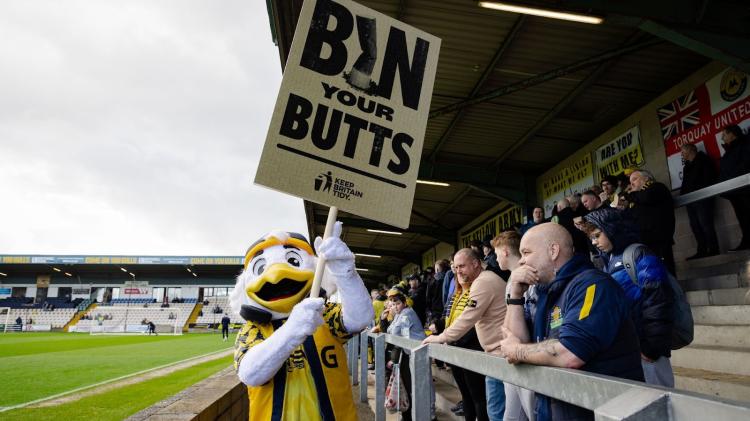 Torquay United and mascot Gilbert backing Bin Your Butts campaign