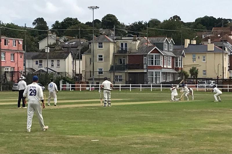 Neil Hancox hits a six