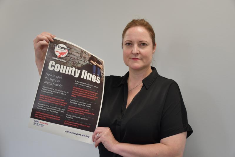 Alison Hernandez with poster