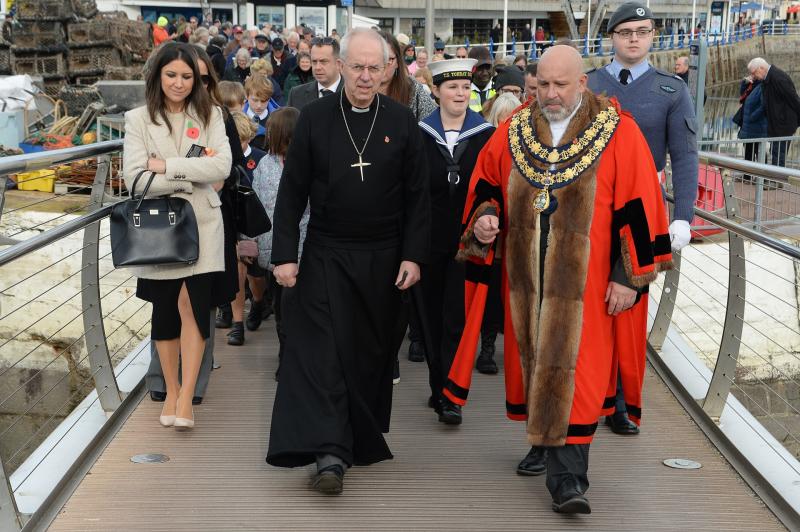 Archbishop Justin Welby and mayor Mark Spacagna at Torquay harbour