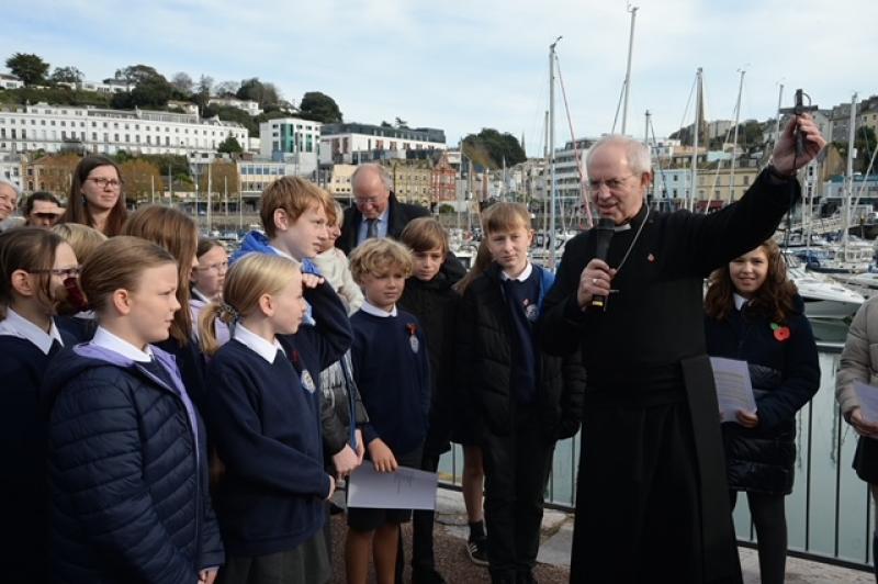 Archbishop Justin Welby with local school children