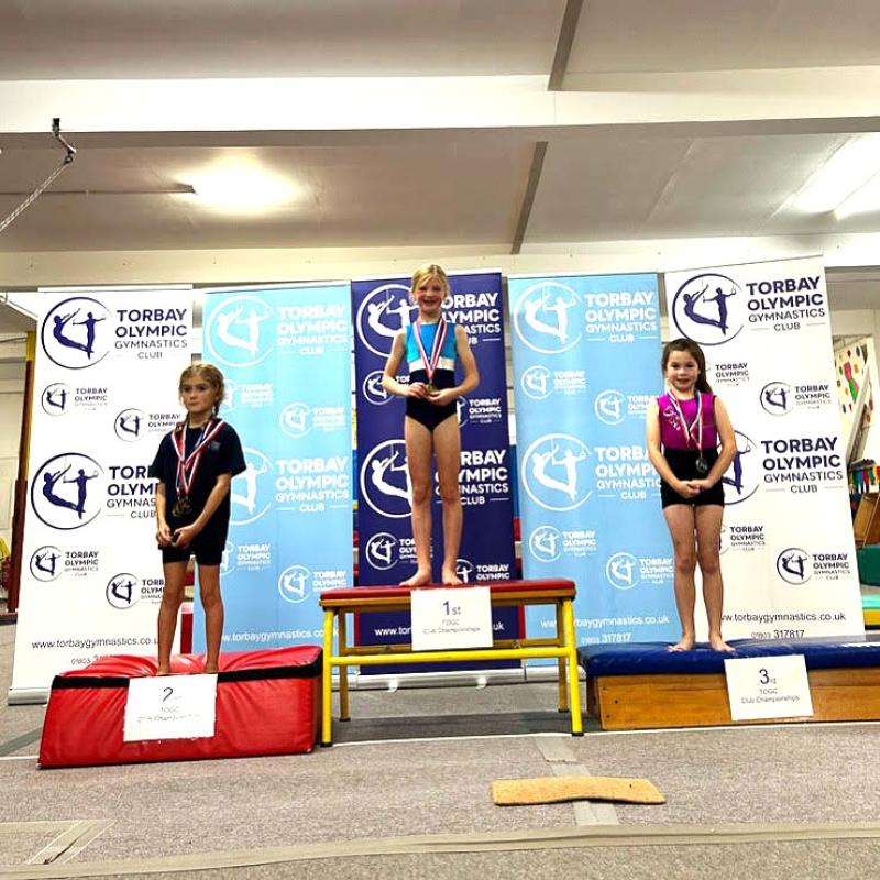 Gymnasts on the podium