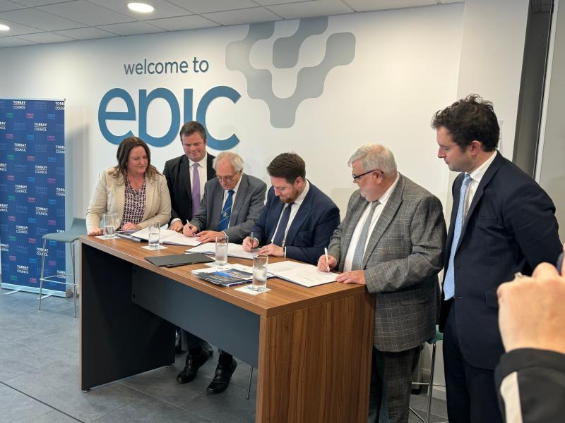 Devon Devo Deal signing