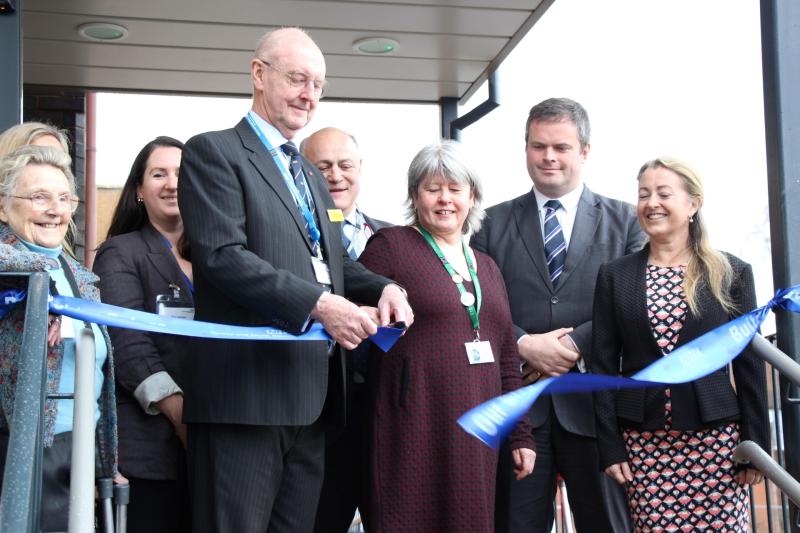 Sir Richard Ibbotson, chair, and Liz Davenport, chief executive, cut the ribbon to open the new Torbay Hospital theatres
