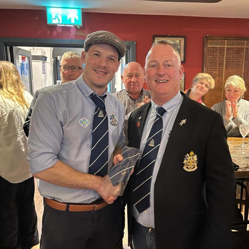 Richard Champion achieving 100 with tie presented by Club President David Siddall