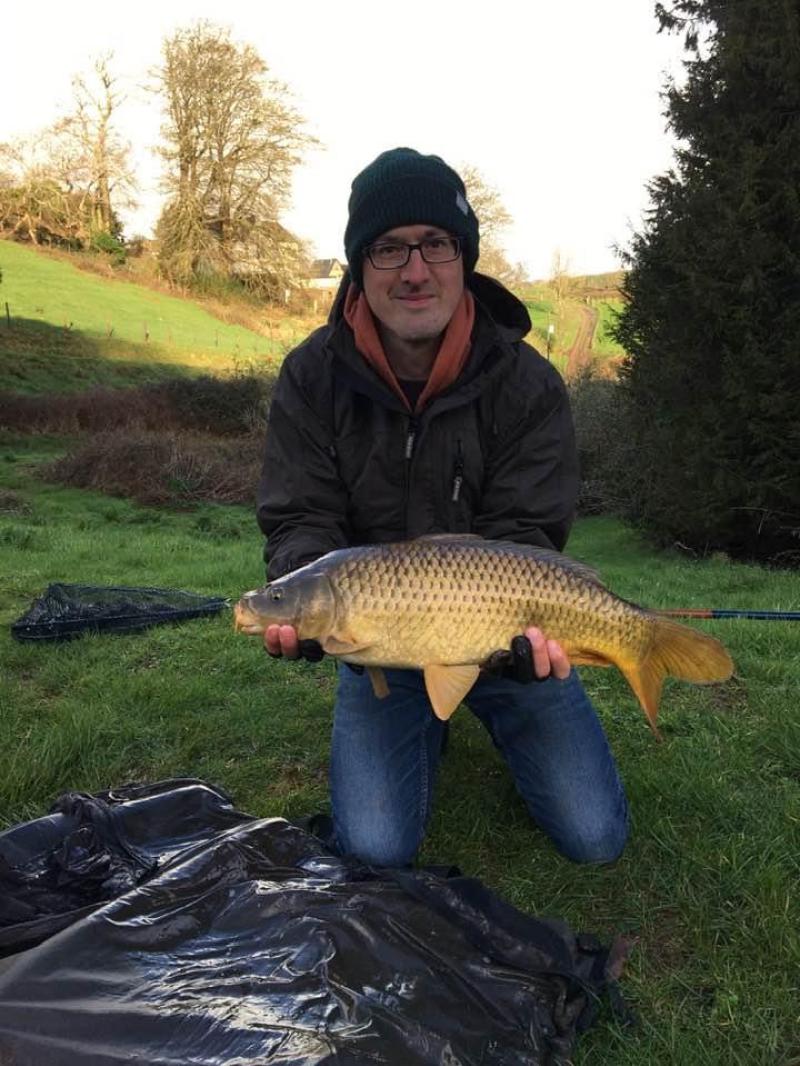 Paul King with a Common Carp from Willow Pool at Newbarn