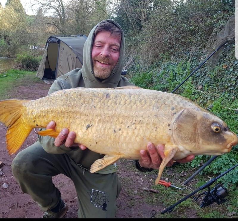 Peter Newton with a Ghost Carp from Newbarn Angling Centre