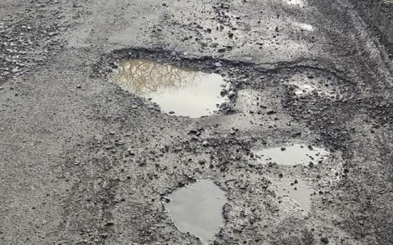Discussing pot holes not on the agenda for April meeting