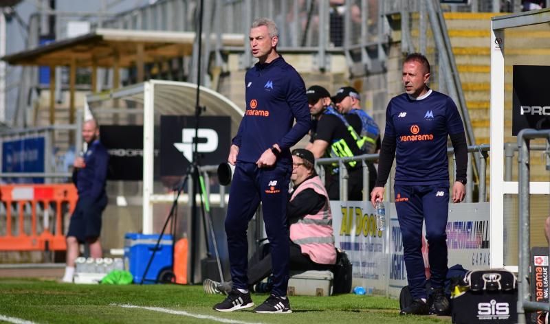Aaron Downes on the Plainmoor sidelines