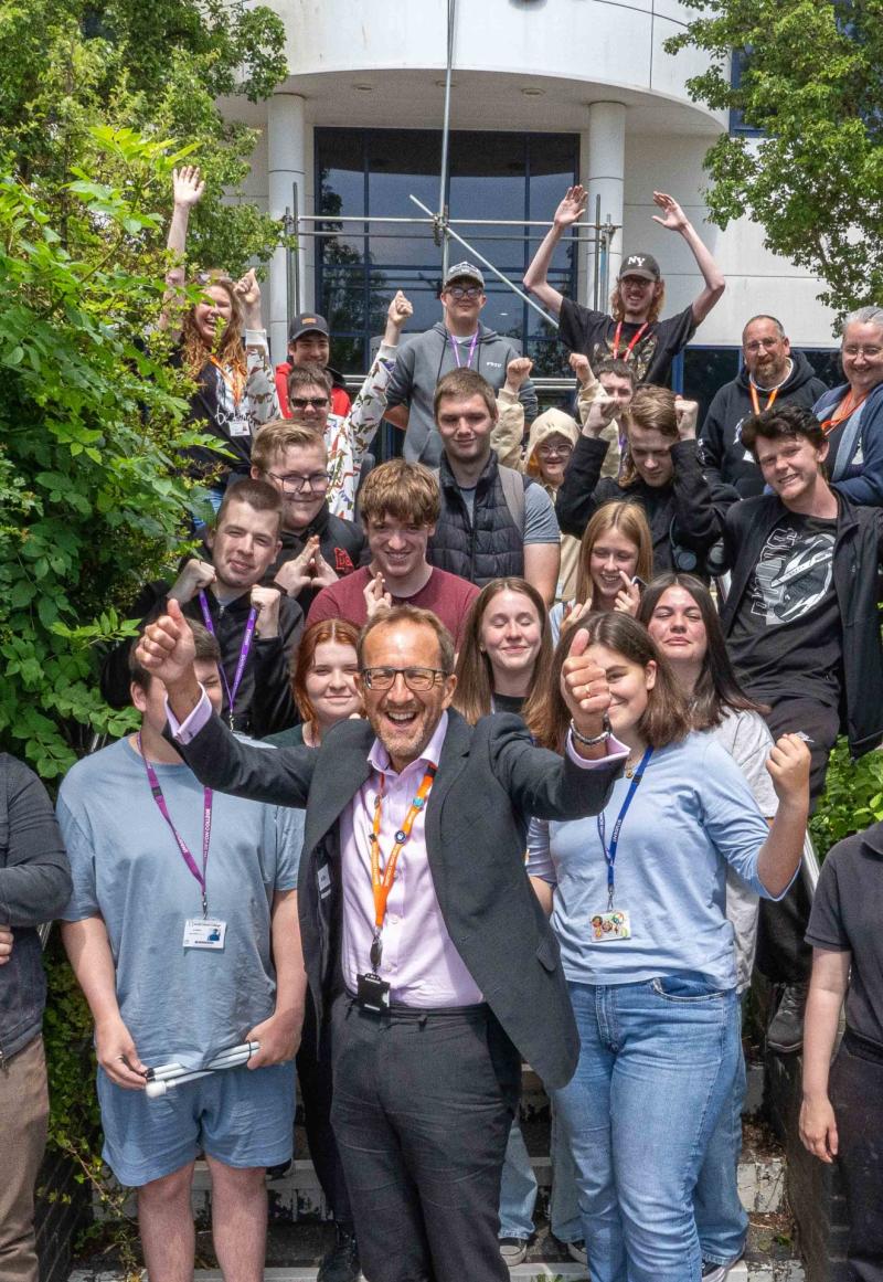 South Devon College principal Laurence Frewin celebrates with students