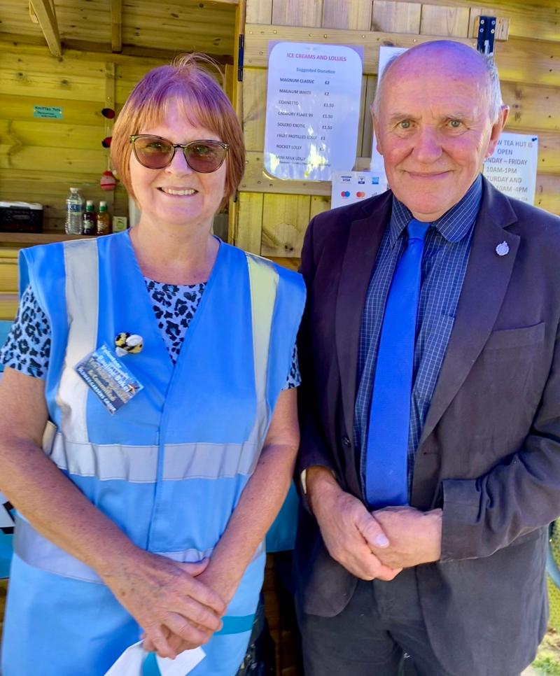 Oldway volunteers open new tea hut and life-saving defibrillator