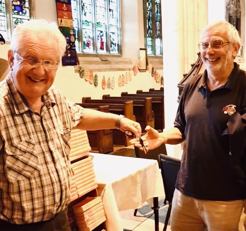 Brixham church Tower Captain hands over the bells after 20 years