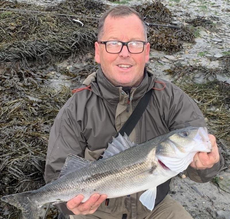 Tony White with the Bass that gave him 4th place in the Cornish lure festival