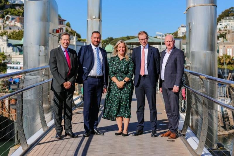 Wollens chief executive Chris Hart (left) with Marco Floreale, Elizabeth Larner, Craig Smith and practice director Clive Meredith