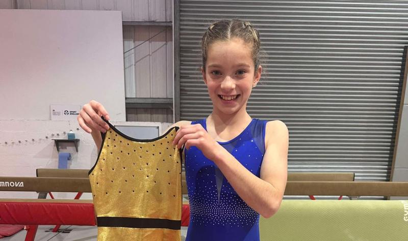 Willow-Mae with her gold leotard