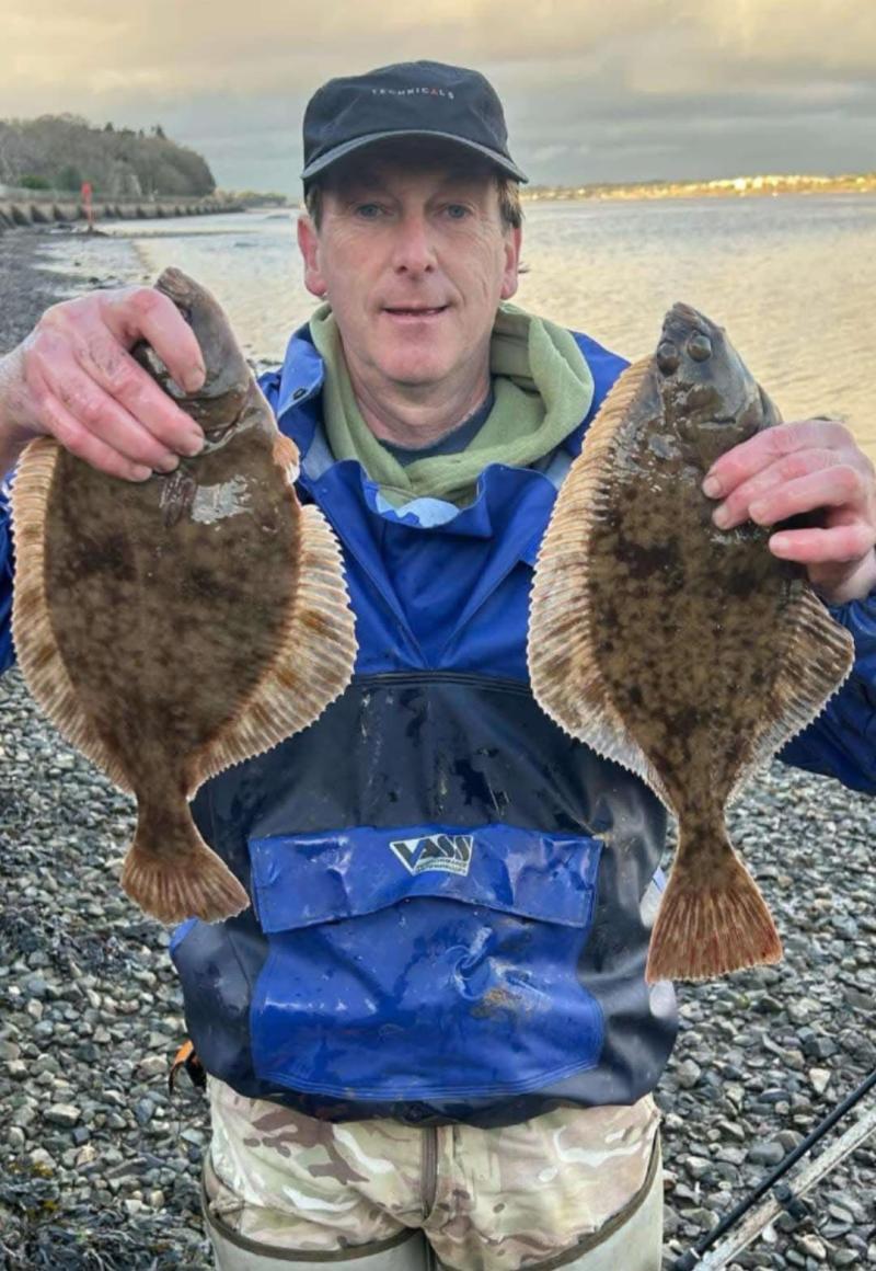 Scott Harris with two Flounders