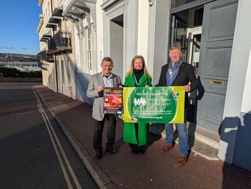 David Rowe (left) and president Gary Phare of Tormohun Rotary with Daniela Hopkins from Children's Hospice South West