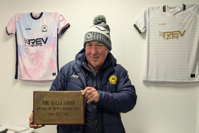 Rob Hobson with the treasured plaque