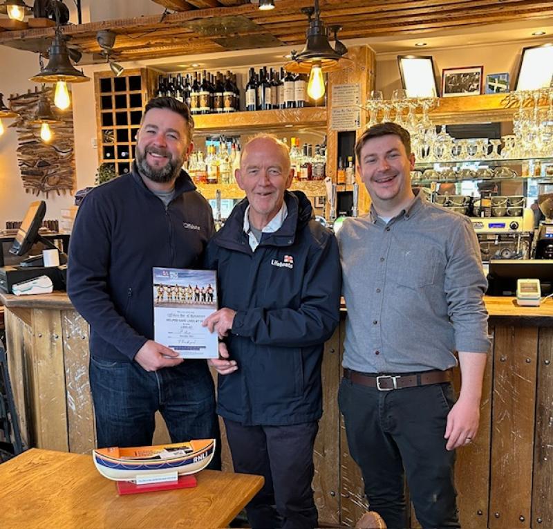 Offshore owner Brett Morton, David Phillips (RNLI Torbay Community Engagement Ambassador) and manager Mark Baines