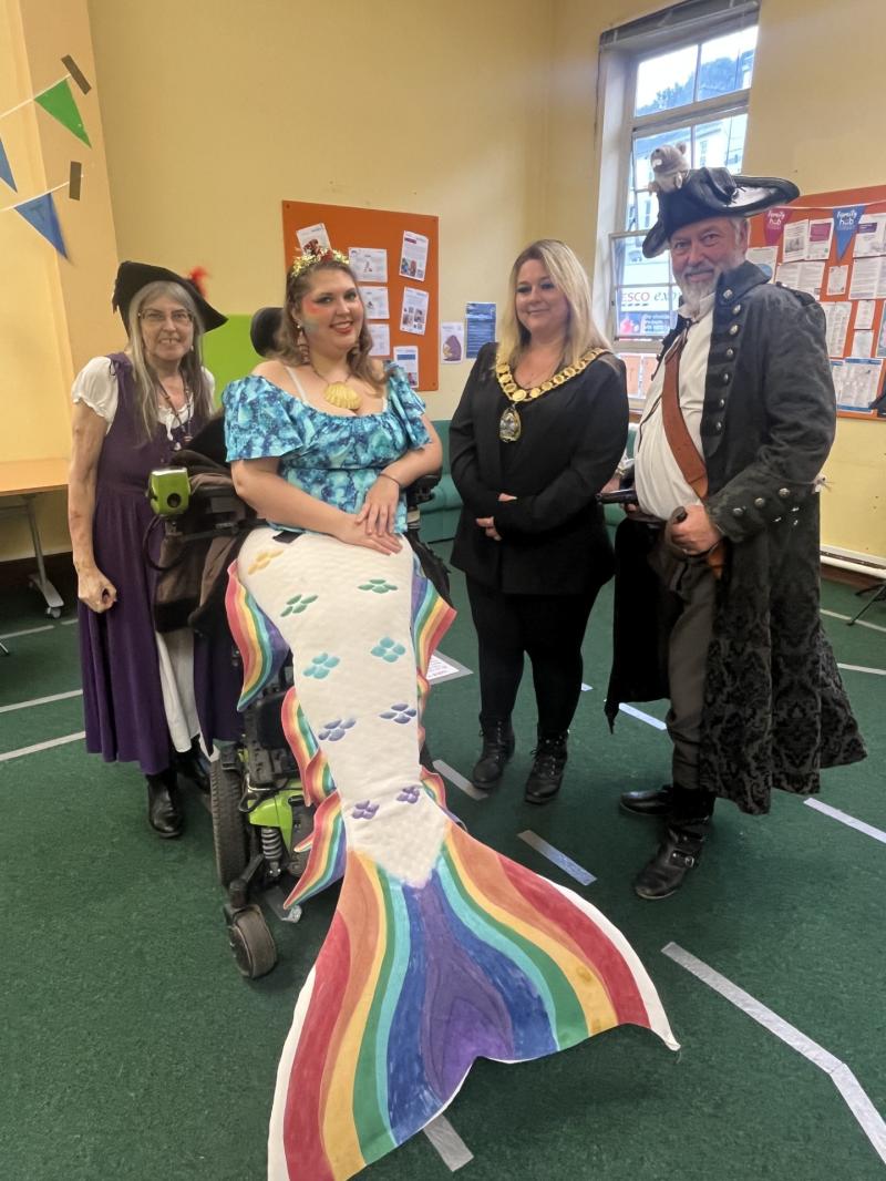 Civic Mayor Hannah Stevens with a Singing Pirate, Mermaid and friends