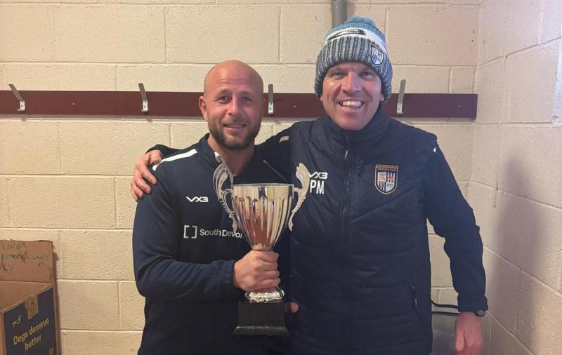 Shane Shobbrook and Paul Mills celebrate a league title for Kinsgkerswell